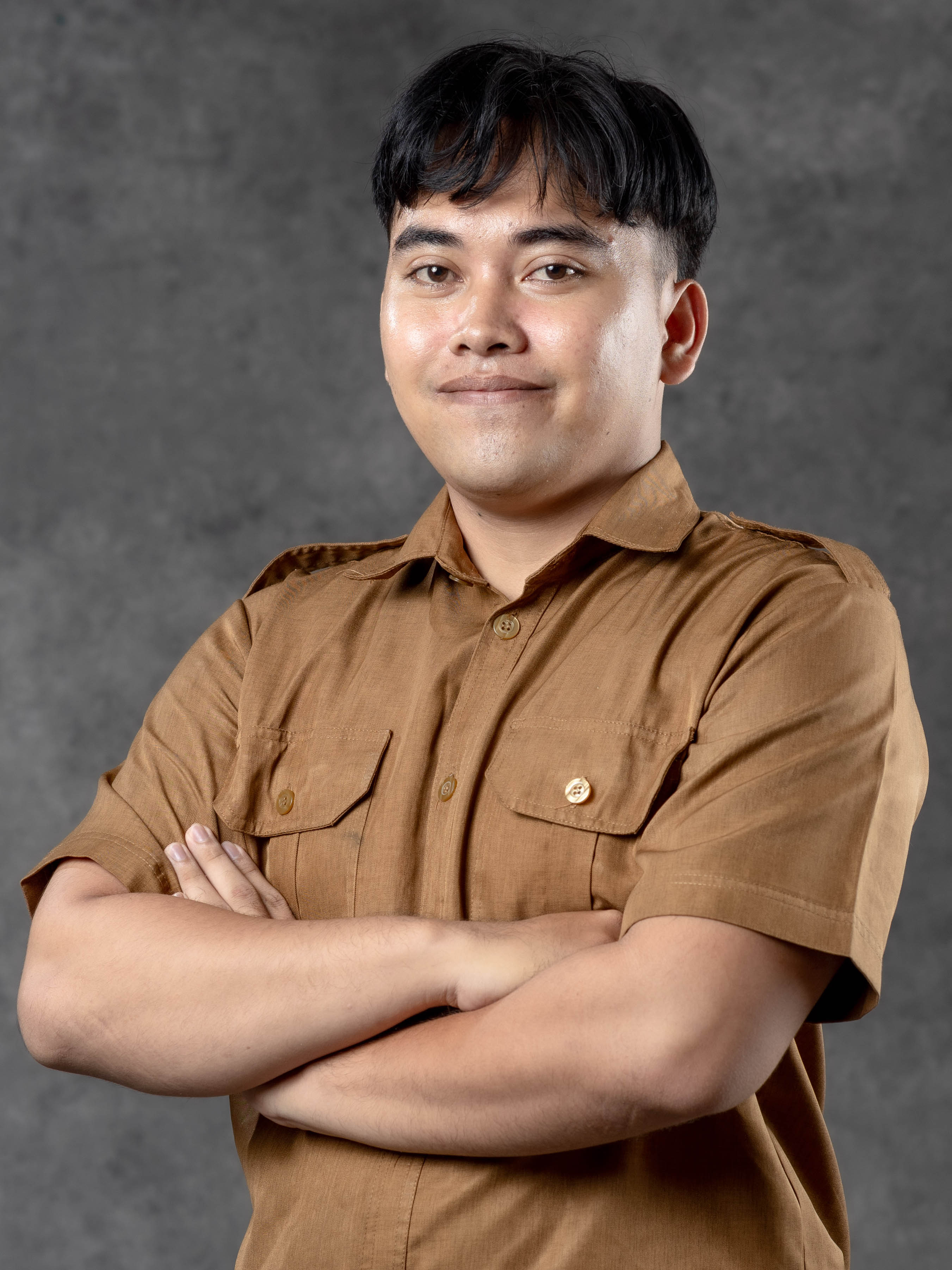 Taulani, S.Kom.